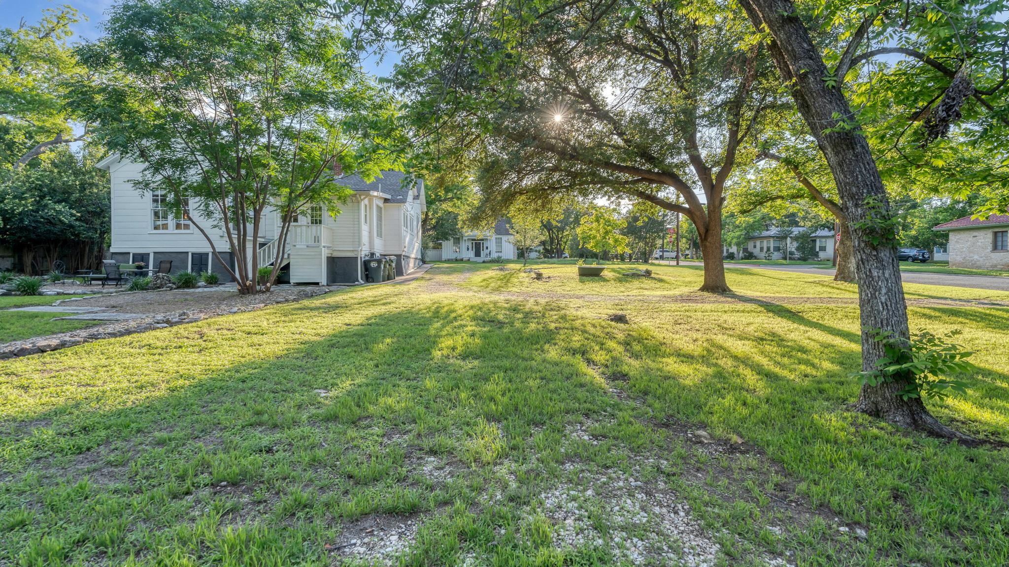 Property photo for 1301 and 1305 S College St showing the Old Town Georgetown setting