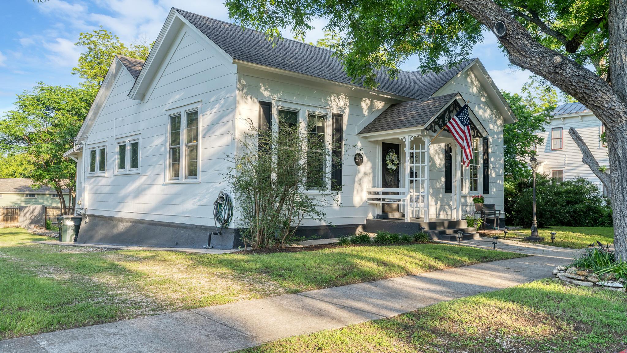 Old Town Georgetown property photo showing exterior setting and mature landscaping