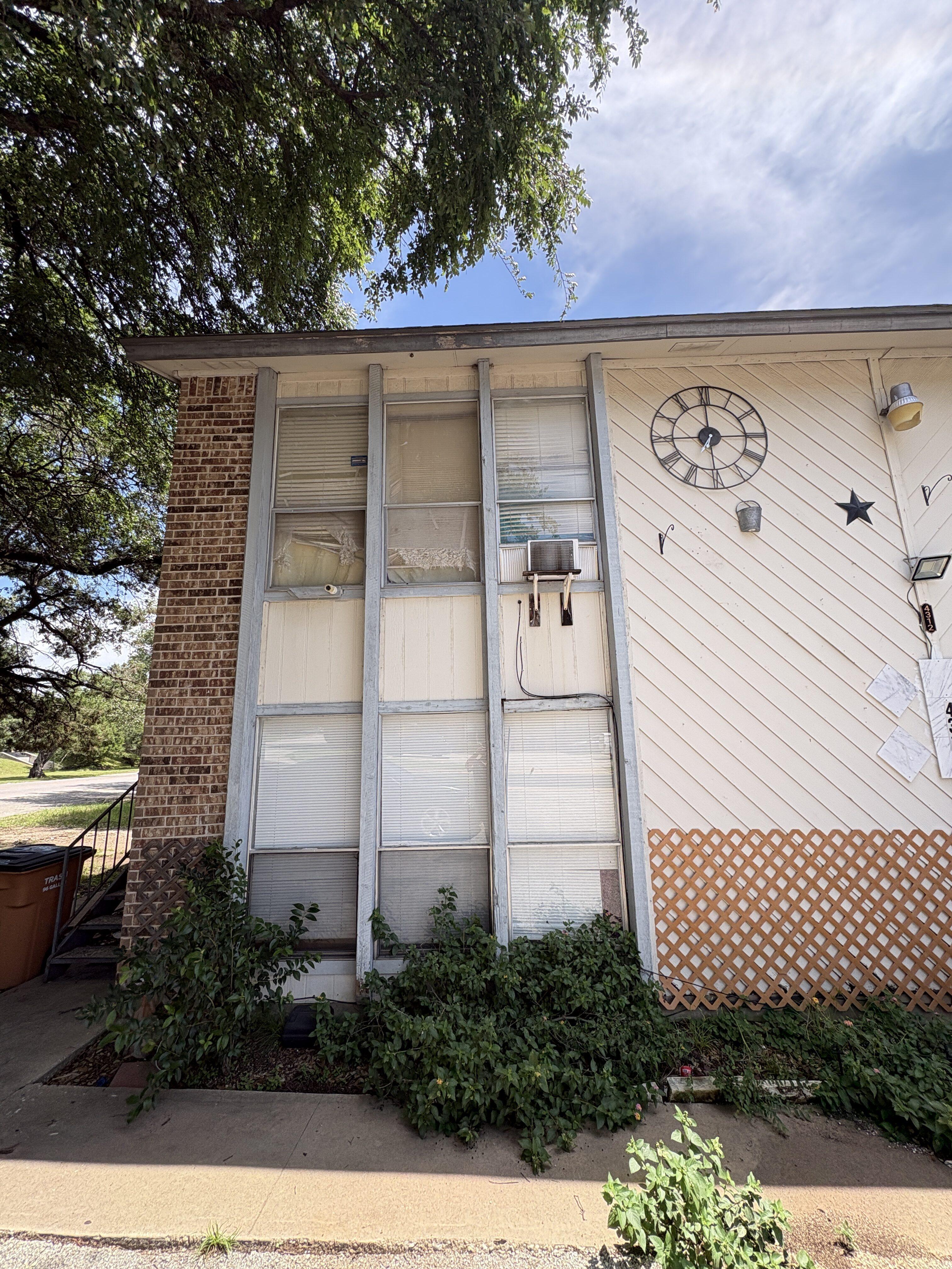 Exterior window and siding detail at 4312 Acropolis Ct Austin Texas