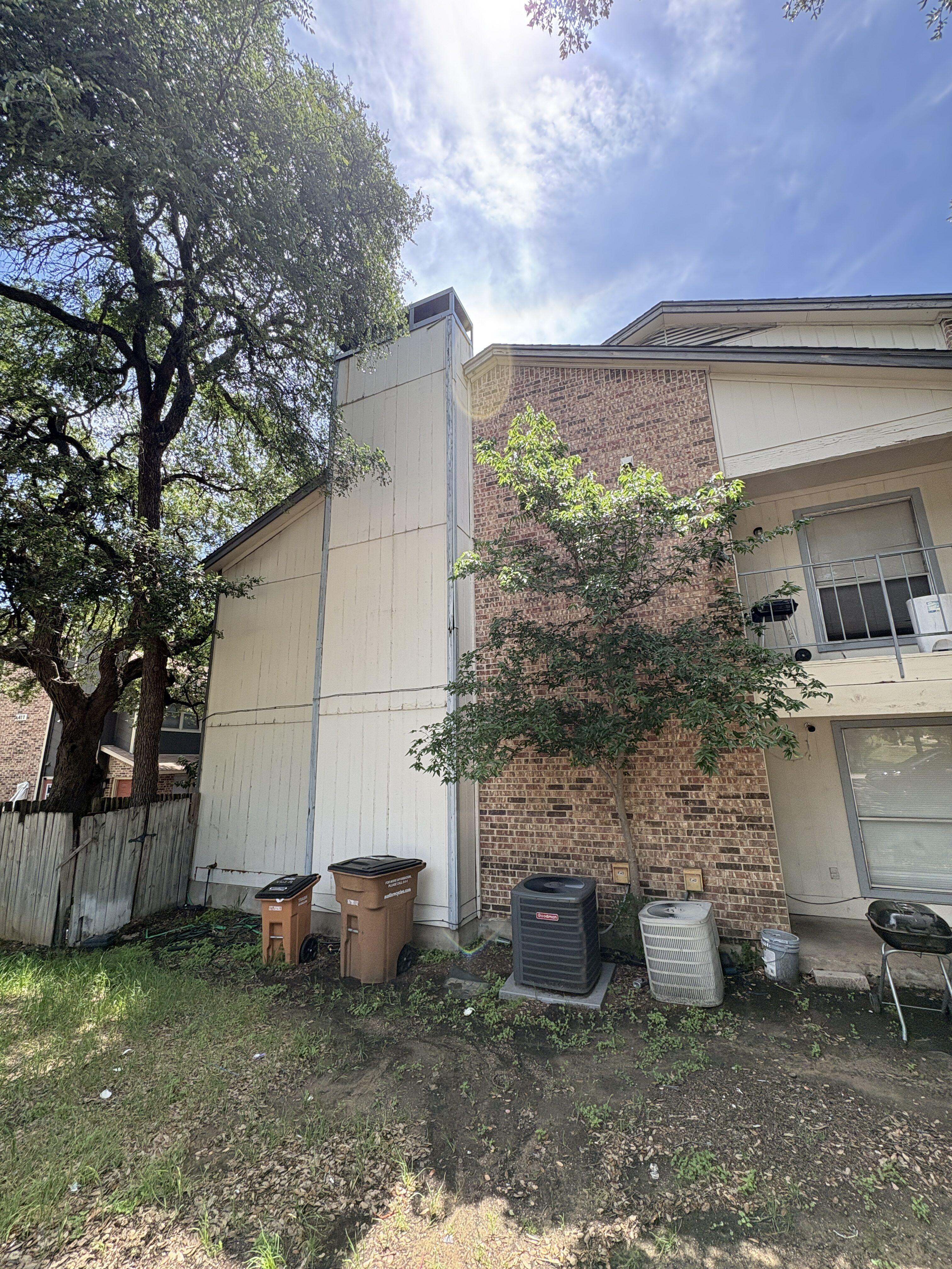 Rear exterior and HVAC area at 4312 Acropolis Ct Austin Texas