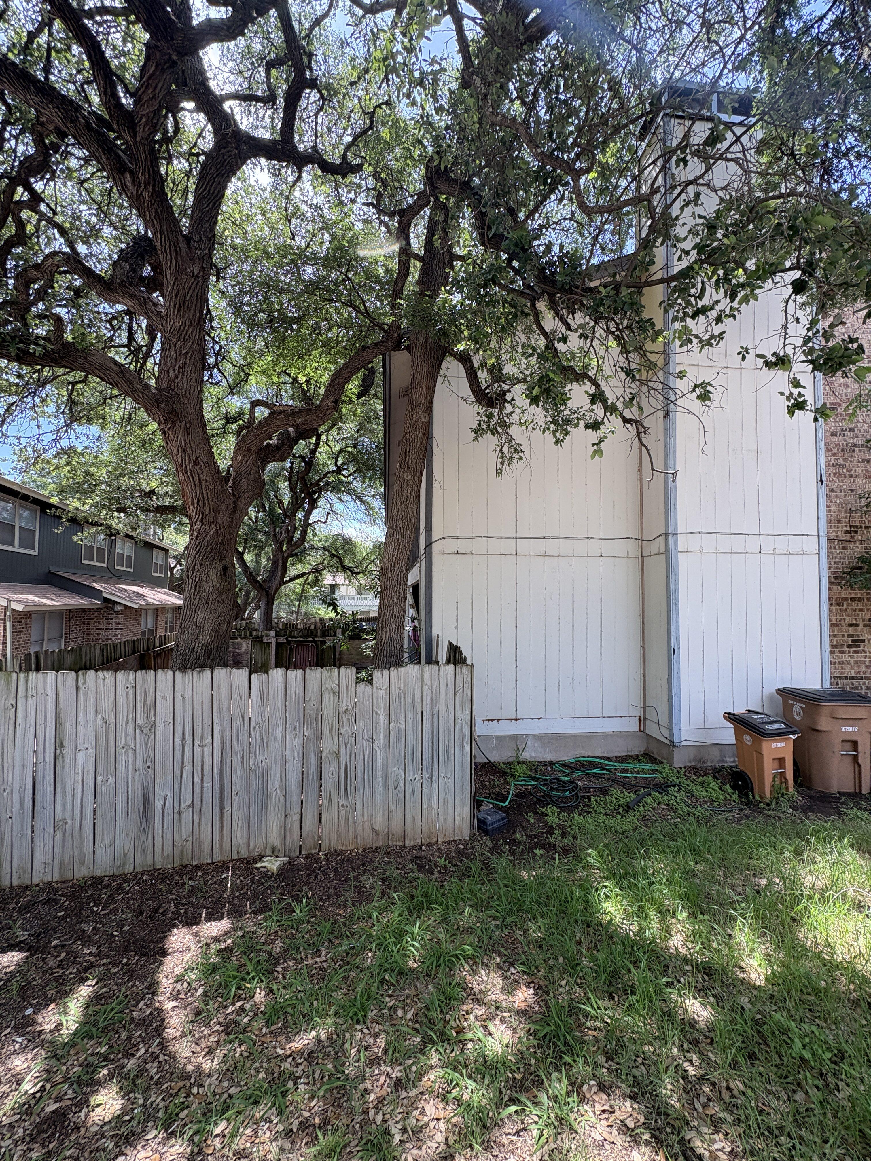 Fence and side yard area at 4312 Acropolis Ct Austin Texas