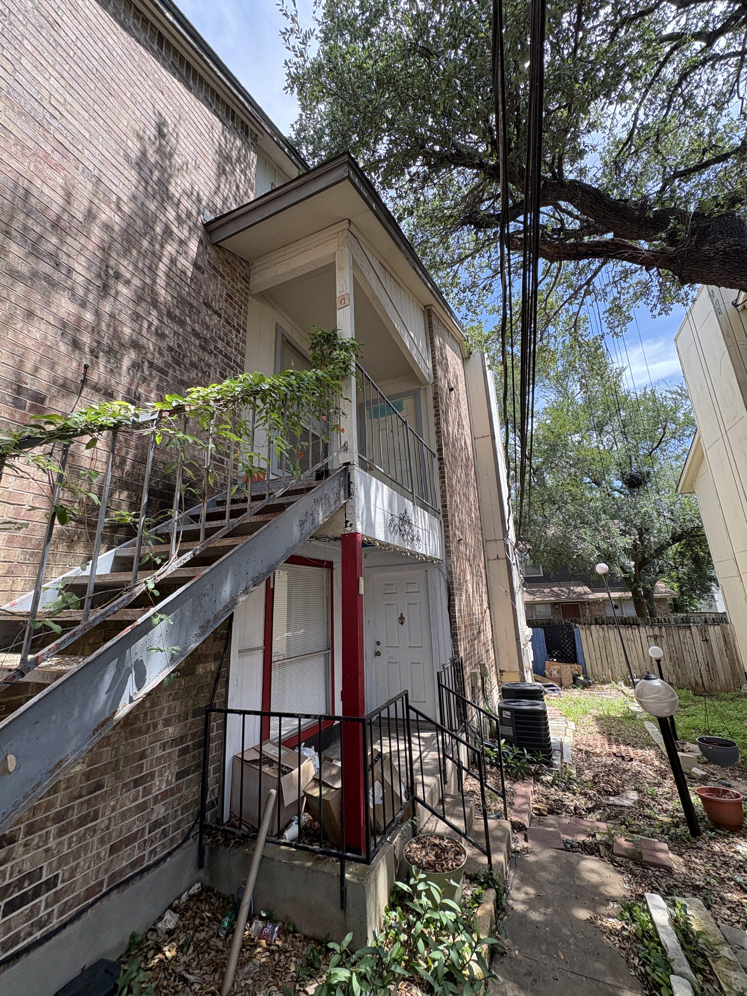Exterior staircase and entry area at 4312 Acropolis Ct in Austin Texas